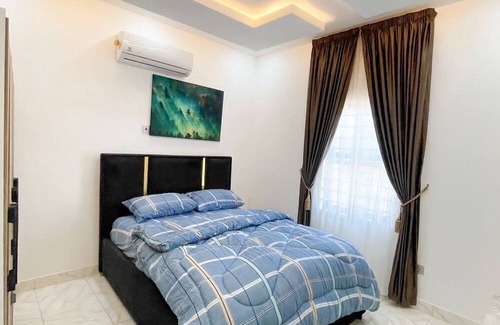 Teshie Apartment | 2 bedroom furnished appartment with a roof top bar for relaxation.