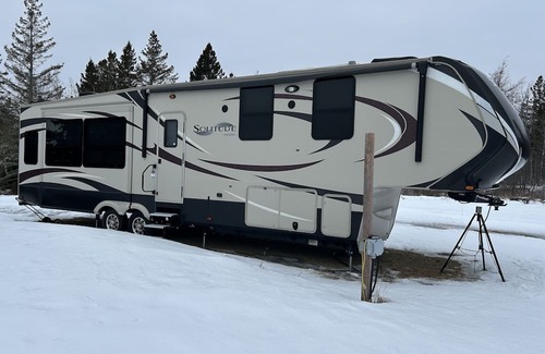 Neguac House | Camping in style with serene waterfront views!