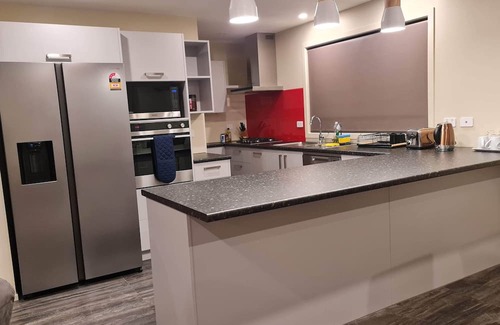 Palmerston North House | El Beracca Retreat - A Home away from home.