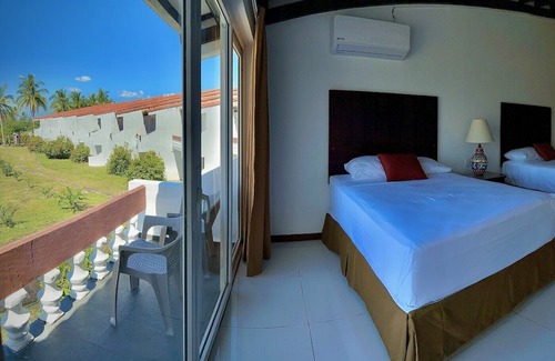 Costa Del Sol Resort | habitación cuádruple