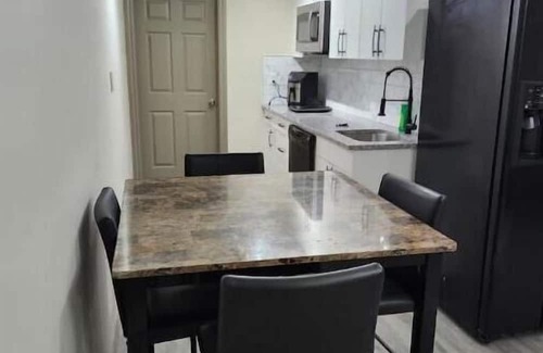 Panorama Hills House | Cozy 2 bed suite in calm neighborhood and dedicated parking