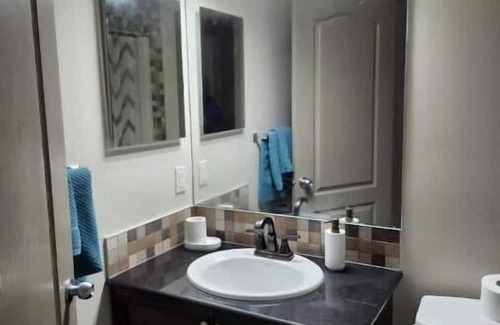 Panorama Hills House | Cozy 2 bed suite in calm neighborhood and dedicated parking