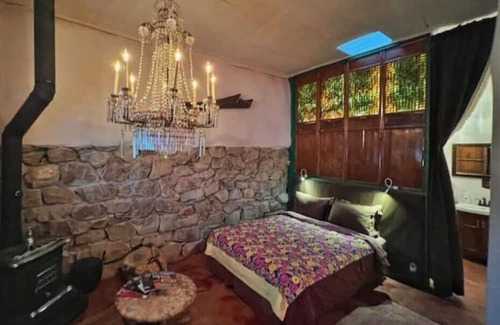 Cerrillos House | Romantic, Rock Carriage House, Hot Tub, WoodStove, on Historic Property