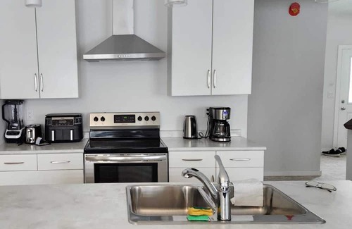 Winnipeg House | ChessKings Luxurious 4 Bedrooms in Sage Creek