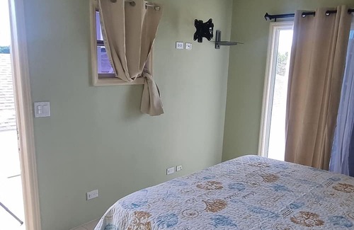 Nassau House | Tropical Haven. Your home away from home to relax and enjoy the island breeze.