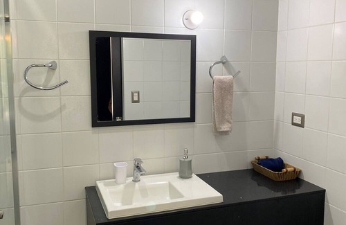 Zona 8 Apartment | Luxury Cayala 2BR/2BA suite w/sunlit balcony near US Embassy, modern amenities.
