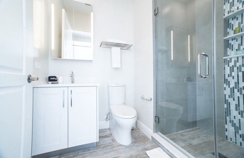 West Bay Condo | 7 Mile Beach views from the Roof terrace. Luxury Condo with Private Beach Club