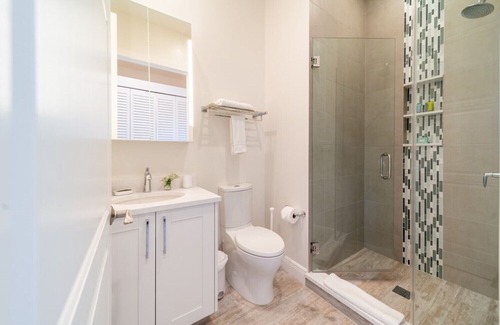 West Bay Condo | 7 Mile Beach views from the Roof terrace. Luxury Condo with Private Beach Club
