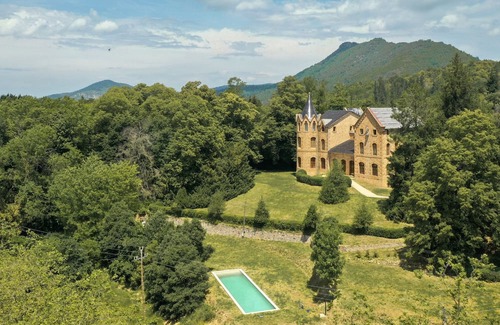 Sant Hilari Sacalm Villa | Elegant Modernist castle in Catalonia, Spain with pool, tower and chapel