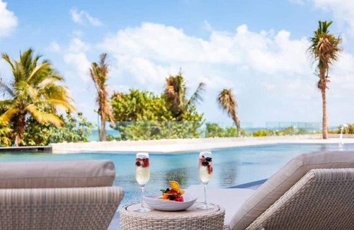 Puerto Juarez Apartment | Mousai Cancun: 5-Diamond Ocean View Corner Suite