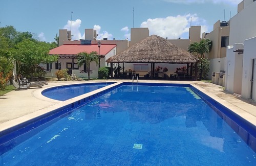 Puerto Juarez Condo | 2-bedroom condo in gorgeous Playa del Carmen with AC, pool, gym,high speed wifi