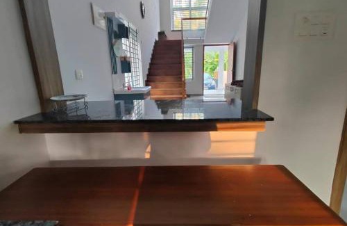 Irinjalakuda Apartment | 2 storied waterfront homestay Thrissur