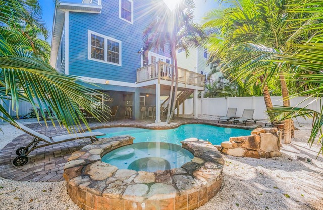 Luxury home with private pool and spa, short walk to beach!