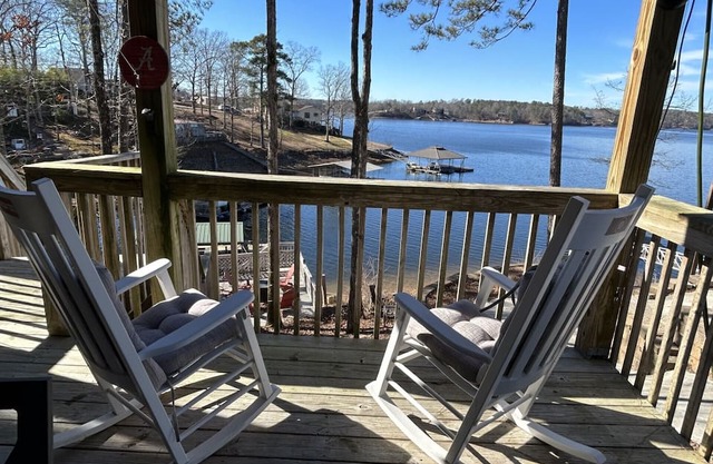 Lakeside cottage with plenty of room . Multiple decks with easy access to water.