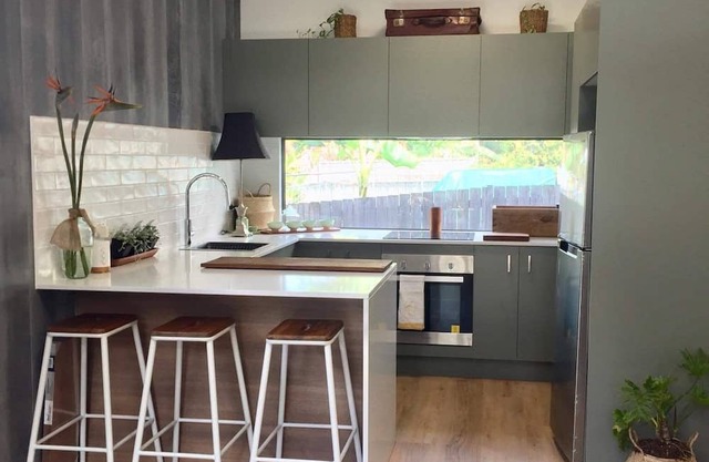 Eclectic bungalow set in under the Japanese Oak but close enough to the ocean.