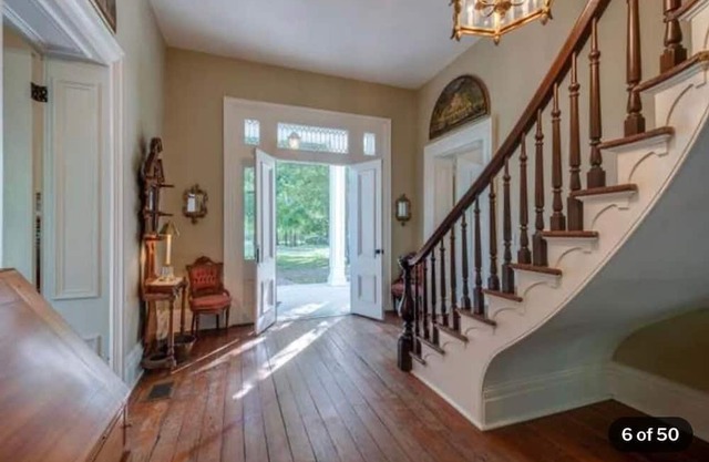 Historic Idlers BNB Retreat on two acres with an Olympic sized pool.