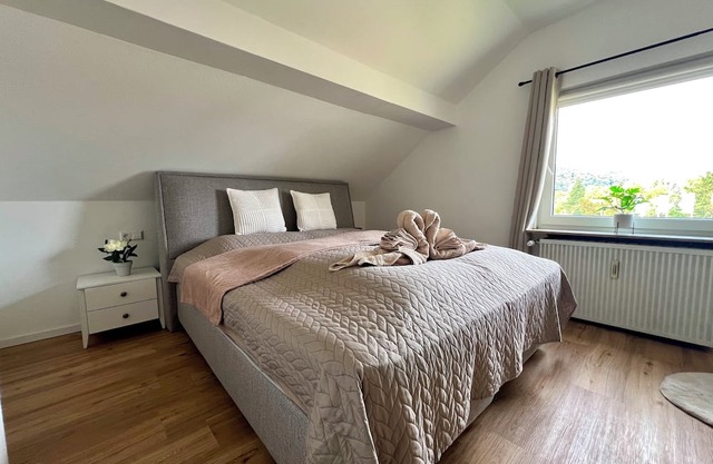 2nd room attic apartment with castle view & king-size bed