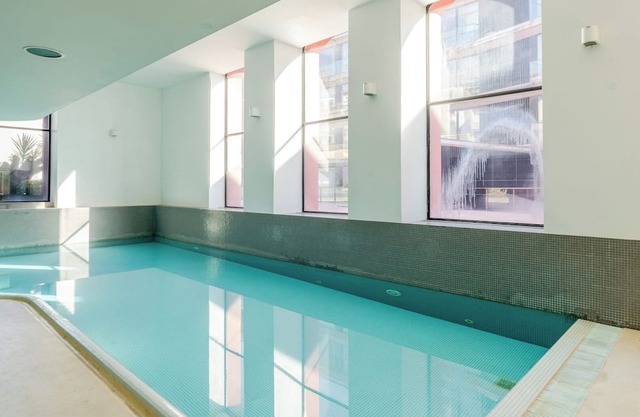 Stylish Open-Plan Flat with Swimming Pool by HostWise