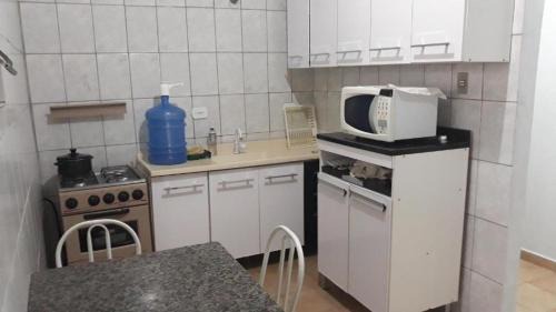 Casa praia grande 70 metros da praia aconchegante