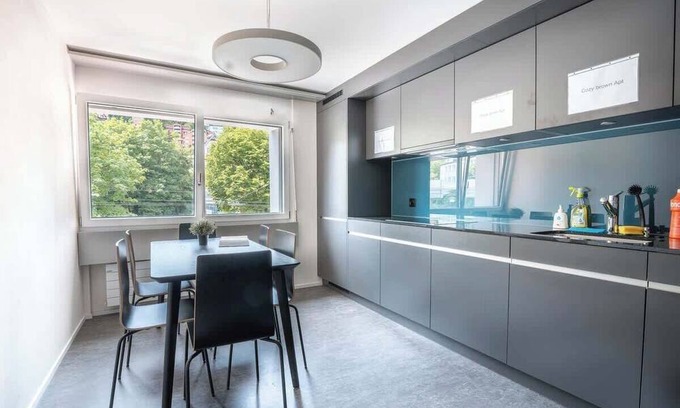 St. Gallen Apartment | Studio funky yellow (2) with shower and kitchen for shared use