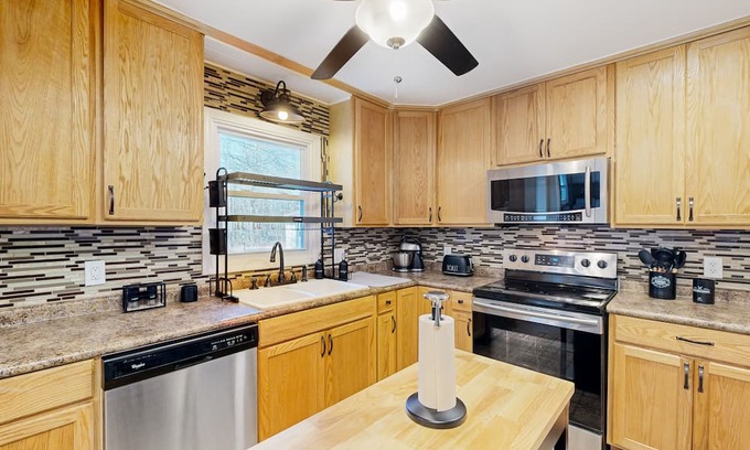 Converse House | Renovated Upcountry home with sun room, fireplace, & central AC - dog-friendly