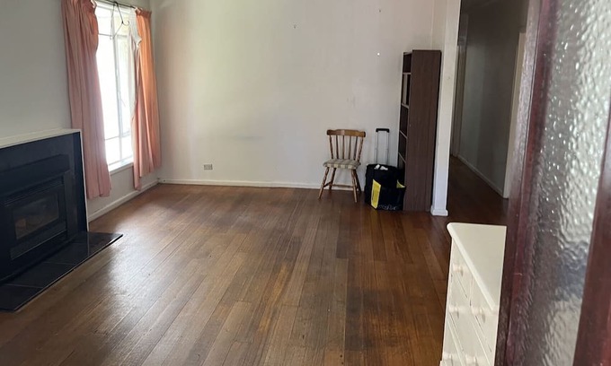 Frankston House | One master bedroom with own bathroom, the other one a bedroom with shared bath.