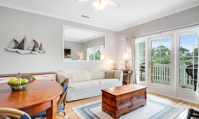 Folly Beach Condo | 2nd-floor retreat with screened porch, shared pool, WiFi, central AC & elevator